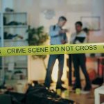 UNBELIEVABLE — Woman Wedged in Wall – Crime Bust! Crime scene with tape and investigators examining evidence.