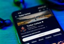 Netanyahu Fires Back At Tucker Carlson Smartphone displaying a YouTube channel profile page.