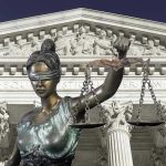 Supreme Court Bombshell — Trump’s Agenda Unleashed Lady Justice statue in front of courthouse.