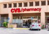 Exterior view of a CVS pharmacy with customers entering