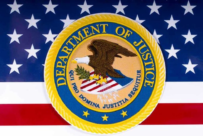1054857686 Department of Justice seal on American flag background.