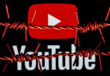 YouTube logo behind barbed wire lines.