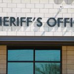 Custody Exchange Turns Into BLOODBATH Sheriffs Office sign on brick building faade.