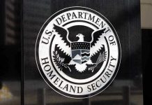 ‘Worst of the Worst’ Sweep Shocks City U.S. Department of Homeland Security emblem on wall.