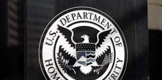 ‘Worst of the Worst’ Sweep Shocks City U.S. Department of Homeland Security emblem on wall.