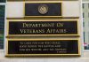 SHOCKING ICE Policy: Are Veterans at RISK? Department of Veterans Affairs building sign with quote.