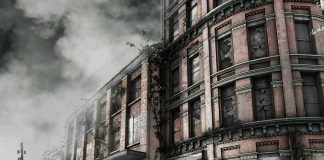 Abandoned building with overgrown plants and construction cones in the foreground