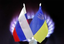 Moscow Bomb Kills Multiple Cops Flags of Russia and Ukraine displayed together