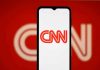 BRUTAL Takedown Leaves CNN Panel Stunned CNN logo on a phone screen.