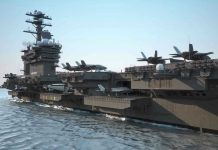 Museum Ships Hold Secrets of Naval Might Aircraft carrier deck with jet planes.
