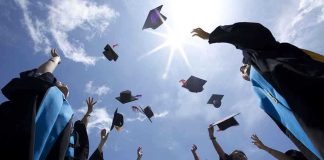 Graduation Canceled Over FAKE Claim—$7.5 Million Verdict Graduating students celebrating by throwing their caps into the air under a bright blue sky