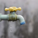 100K Residents Left Without WATER Supply Close-up of a dripping outdoor water faucet