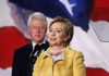 CLINTONS Defied Congress—Criminal Charges Loom Hillary Clinton delivering a speech with Bill Clinton in the background
