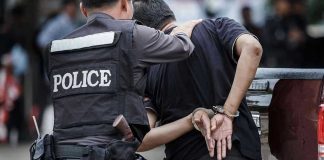 Police Officer ARRESTED—Child Abuse Scandal Explodes Police officer arrests handcuffed person.