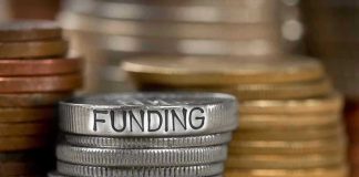 Stack of coins labeled funding with other coins stacks