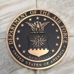 Bronze seal of the Department of the Air Force on a tiled surface