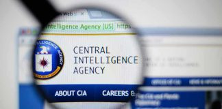 Magnifying glass over Central Intelligence Agency webpage.