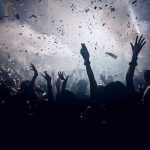 Islamist Plot THWARTED — Taylor Swift Concert Saved! Crowd celebrating under confetti and bright lights.