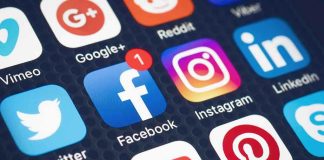 Terrifying FACEBOOK Post Triggers RAPID ARREST Social media app icons displayed on a smartphone screen.