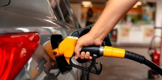EXTREME Pump PAIN Hits 6 States A person refueling a car at a gas station