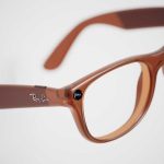 Free AI EYES For 130,000 Veterans! Brown plastic eyeglasses with clear lenses on a white background