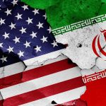 JUST IN — PEACE SHATTERED — Trump Declares IT’S OVER Cracked American and Iranian flags on a wall.