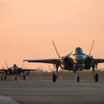 China’s GREATEST WEAKNESS Just EXPOSED! Jets on runway at sunset.
