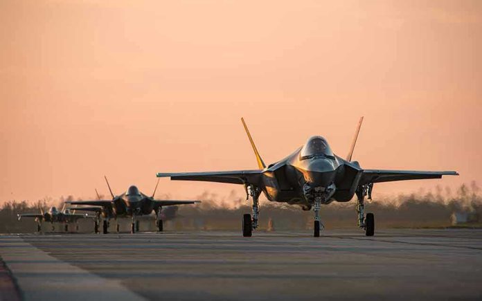 Jets on runway at sunset.