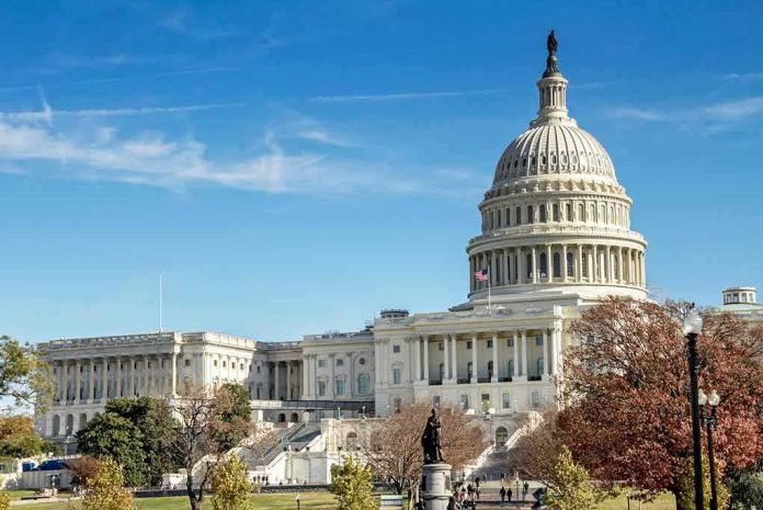 shutterstock_1039171084 United States Capitol building with dome and autumn trees