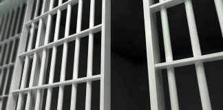 UNTHINKABLE KILLER RELEASE Plan Twarted! Prison cell bars in close-up