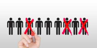 A hand using a red marker to cross out human figures in a selection process