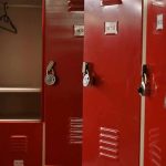 TWISTED RULING — Bathroom Battle EXPLODES in Federal Court Red metal lockers with combination locks