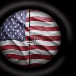 JUST IN — Iran Barrage AIMED at US BASES — What Got HIT? View of the American flag through a sniper scope
