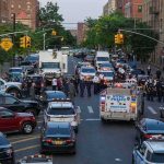 ABSOLUTELY SHOCKING — Murder PLUNGE Baffles DC Police vehicles and officers block a city street during an active scene