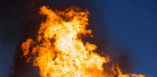 BOMBSHELL — Fetterman TORCHES DEMOCRATS Large flames against a dark blue sky