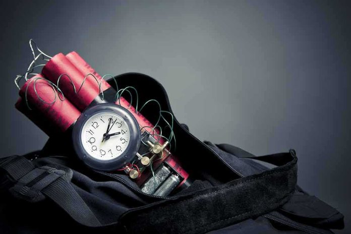 shutterstock_108486044 Time bomb with clock and dynamite sticks in a black bag