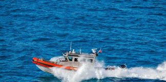 Miracle PLUNGE — WHY HE DID IT! coast guard patrol boat speeding across open ocean