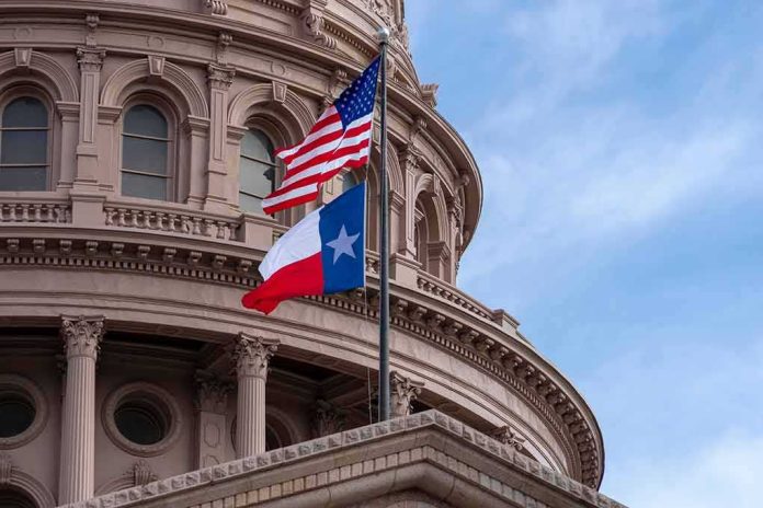 Texas and U.S. flags in front of a capitol building dome