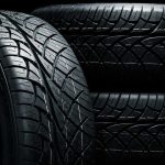 Seventy Percent Of Tires — GONE Close-up of car tires with detailed tread patterns