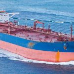 HORMUZ SHOCK — Ships Disappear Large cargo ship navigating through the ocean