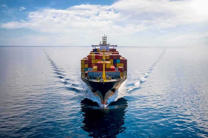 Container ship sailing on calm ocean