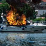 Tour Boat INFERNO Near Fethiye Motorboat on fire near a riverside city