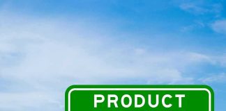 Green road sign reading product recall against blue sky