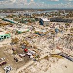 ANOTHER Deadly Quake STRIKES! Aerial view of coastal town with widespread storm damage