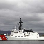 Retaliation BOMBSHELL Inside Coast Guard A U.S. Coast Guard ship docked under cloudy skies