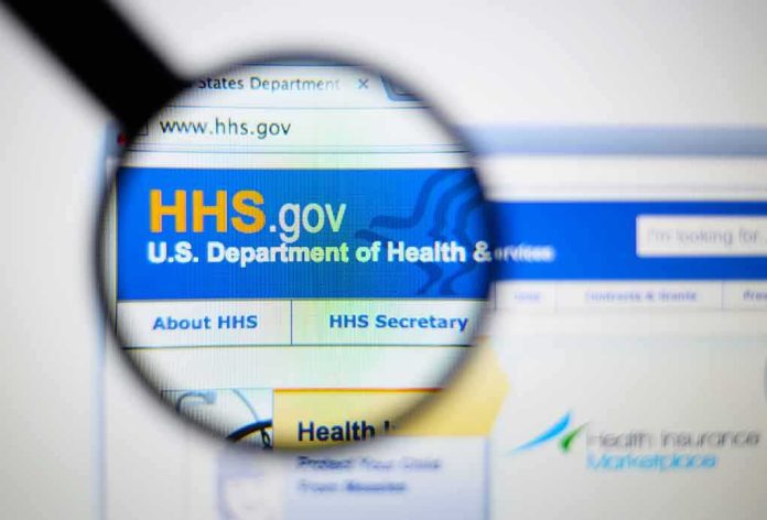 shutterstock_255304579 Magnifying glass over HHS.gov website header