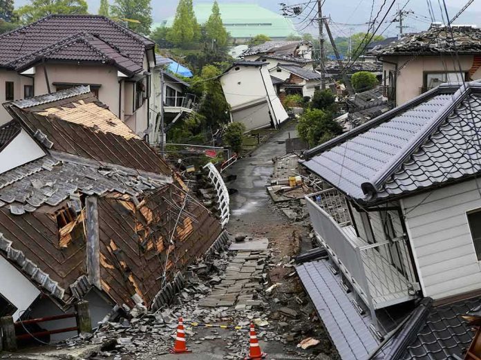 Earthquake-damaged residential street with collapsed houses