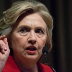 Clinton’s “Experiment” With Youth SPARKS BACKLASH woman speaking at microphones