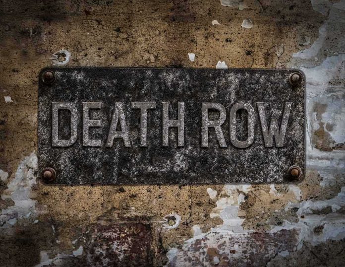 Rusty metal sign on worn concrete wall