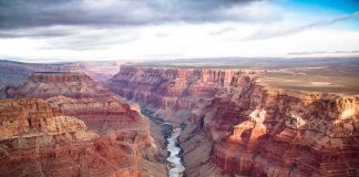 Grand Canyon with river winding through layered red cliffs